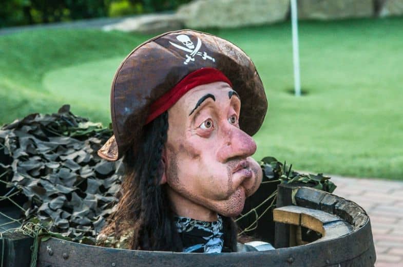 pirate themed features at a crazy golf course in woking