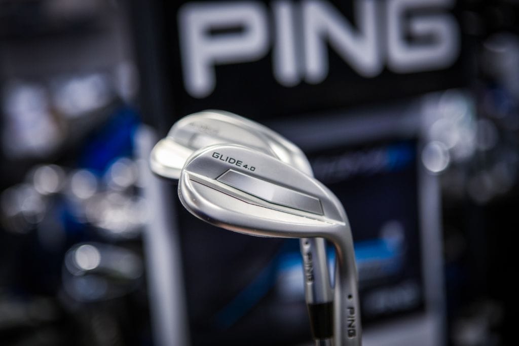 close up of ping irons at a golf shop near woking