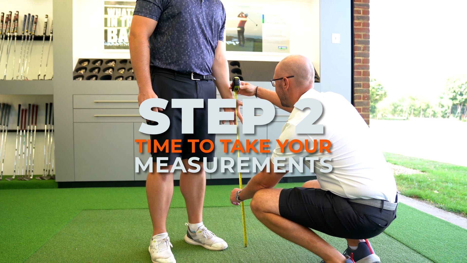 golf coach measuring golfers arm during a custom fitting in surrey