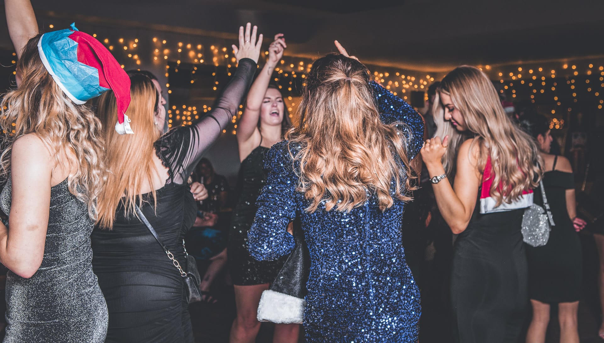 women dancing and having fun at a christmas party in woking