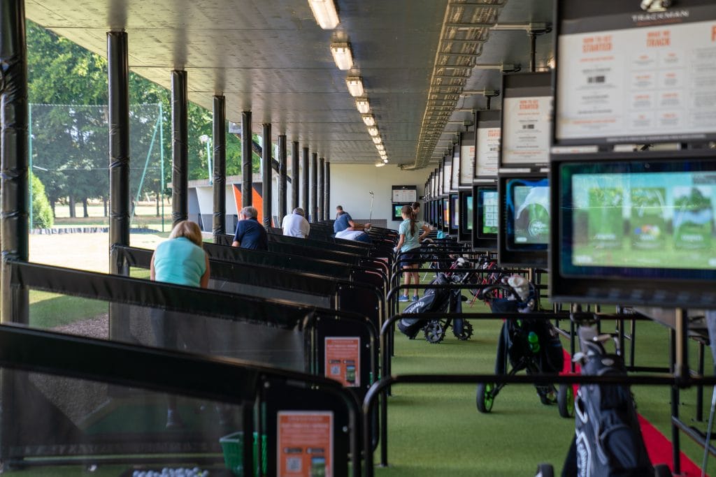 Trackman Driving Range In Surrey | 29 Floodlit Bays | Hoebridge Golf Centre